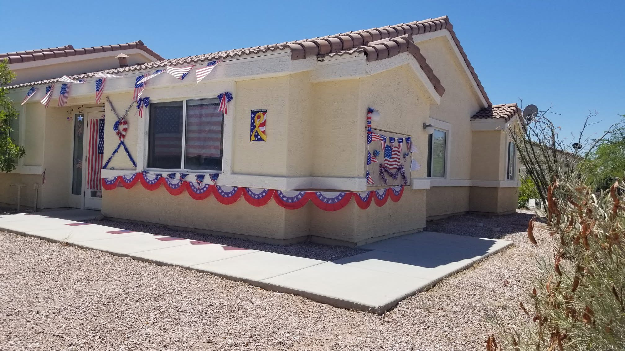 This image displays entrance marker photo of Quartzsite Senior Apartments